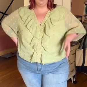 Pale green ruffle top